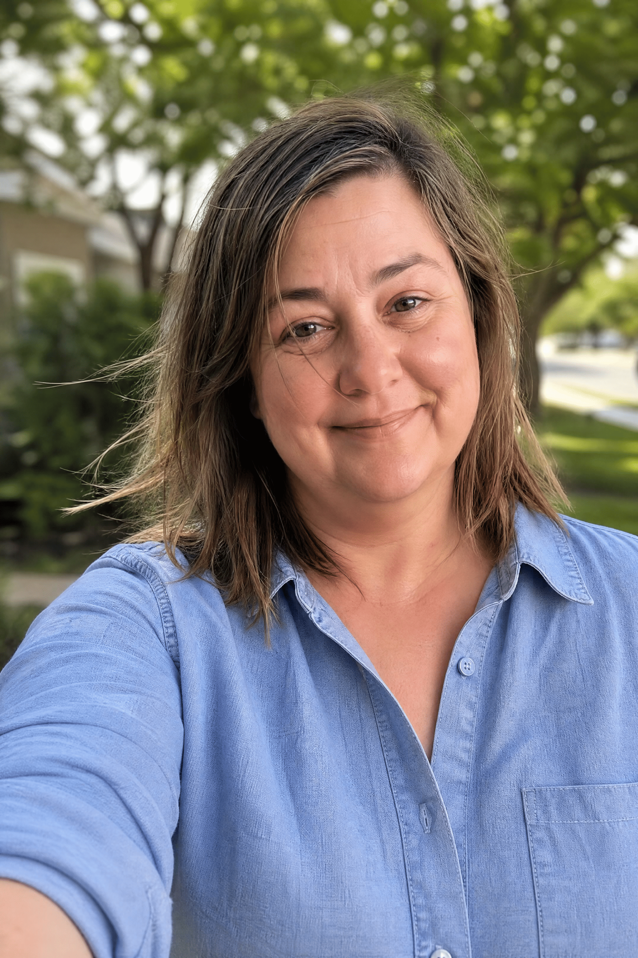 Tania S. — author headshot, healthy and smiling outdoors